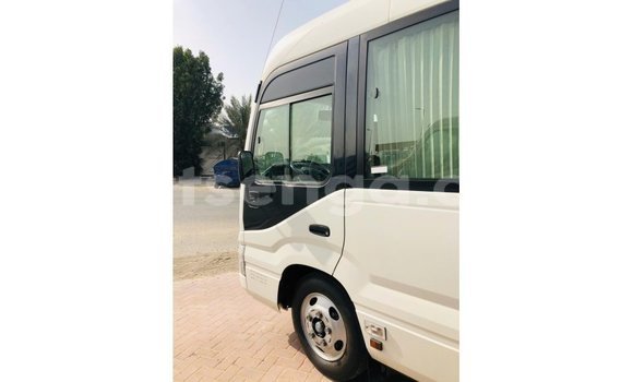 Nunua Imported Toyota Coaster White Gari ndani ya Import - Dubai nchini Hhohho Nunua Imported Toyota Coaster White Gari ndani ya Import - Dubai nchini Hhohho