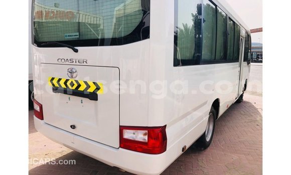 Nunua Imported Toyota Coaster White Gari ndani ya Import - Dubai nchini Hhohho Nunua Imported Toyota Coaster White Gari ndani ya Import - Dubai nchini Hhohho