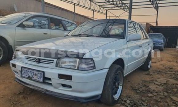 Nunua Ilio tumika Mazda 323 White Gari ndani ya Manzini nchini Manzini Nunua Ilio tumika Mazda 323 White Gari ndani ya Manzini nchini Manzini