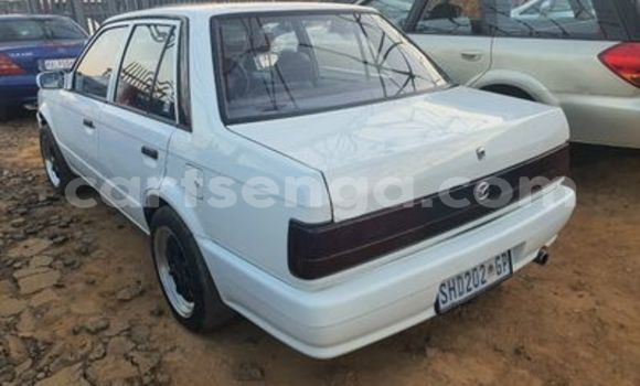 Nunua Ilio tumika Mazda 323 White Gari ndani ya Manzini nchini Manzini Nunua Ilio tumika Mazda 323 White Gari ndani ya Manzini nchini Manzini