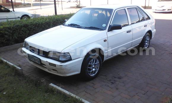 Nunua Ilio tumika Mazda 323 White Gari ndani ya Ezulwini nchini Hhohho