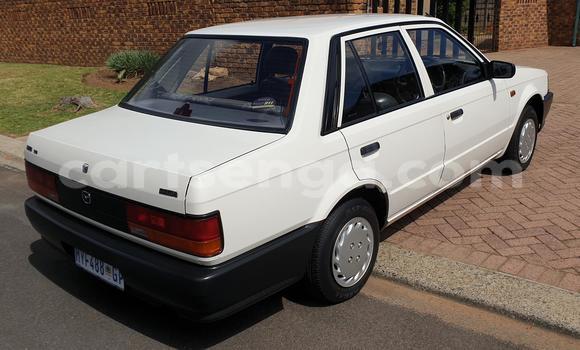 Nunua Ilio tumika Mazda 323 White Gari ndani ya Ezulwini nchini Hhohho Nunua Ilio tumika Mazda 323 White Gari ndani ya Ezulwini nchini Hhohho