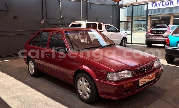 Buy Used Mazda 323 Red Car in Bulembu in Hhohho