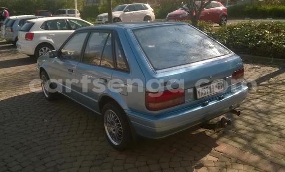 Acheter Occasion Voiture Mazda 323 Bleu à Big Bend, Lubombo District Acheter Occasion Voiture Mazda 323 Bleu à Big Bend, Lubombo District
