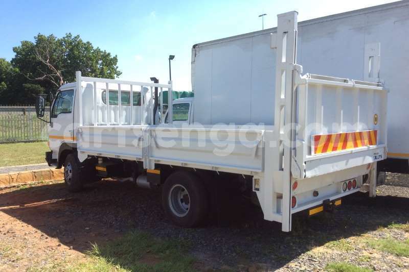 Big with watermark nissan truck dropside ud40 dropside with tail lift 2012 id 60613699 type main 1 