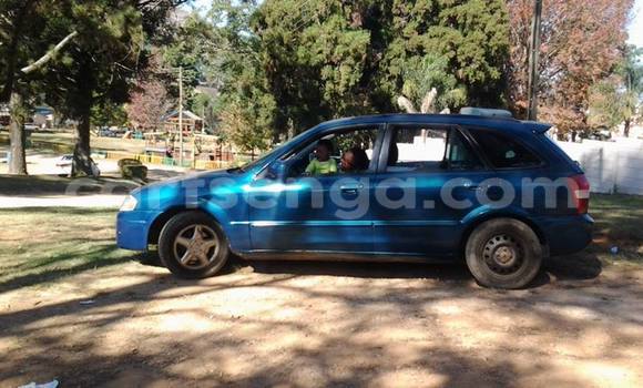 Buy Used Mazda Familia Blue Car in Mbabane in Swaziland Buy Used Mazda Familia Blue Car in Mbabane in Swaziland